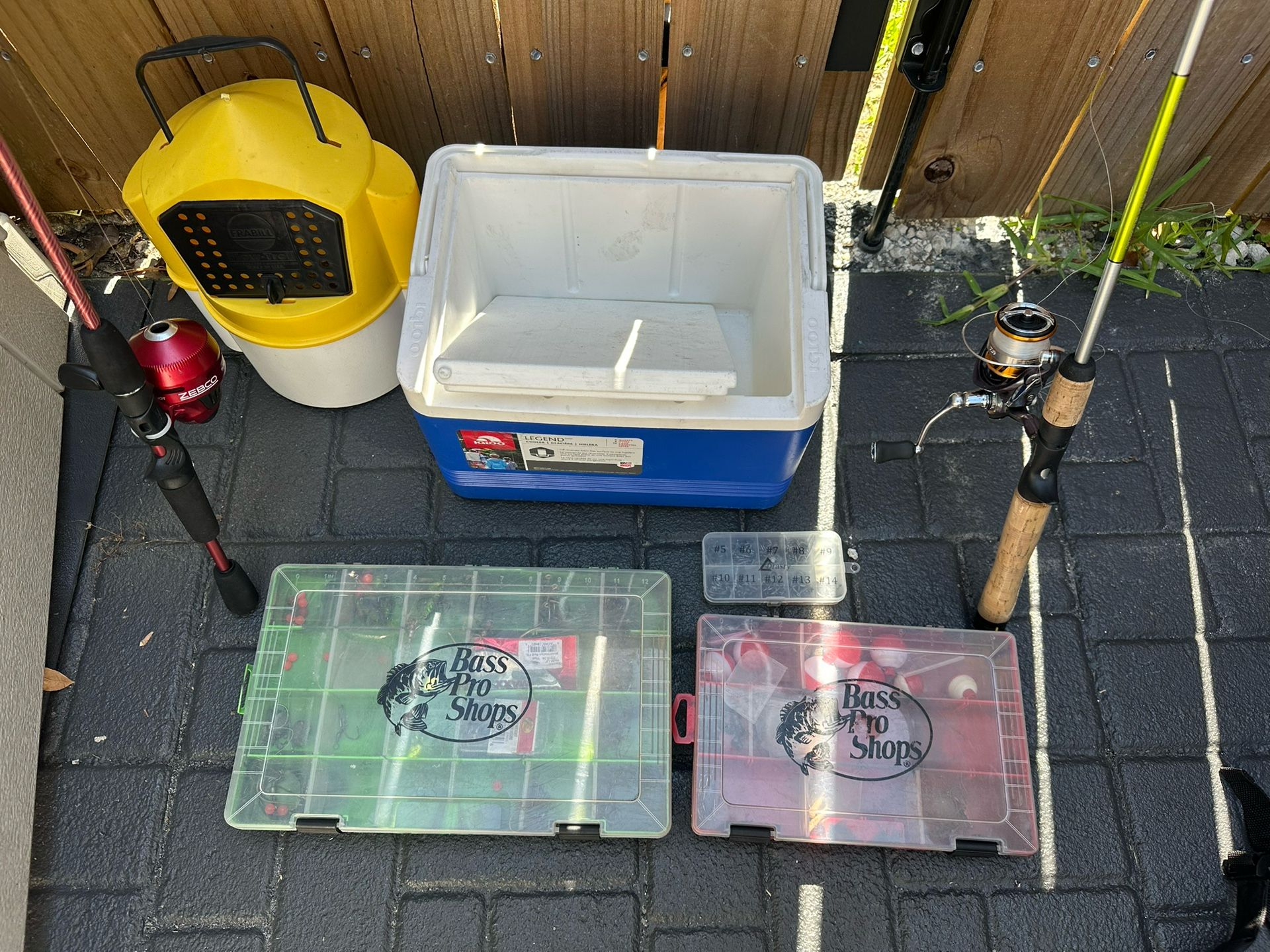 2 Fishing Rods With Other Accessories