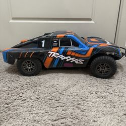 Traxxas Slash 4x4 Brushless RC Truck + 2 Batteries + Charger + Tools