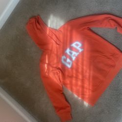 Orange Gap hoodie with white and grey logo #gap #hoodie