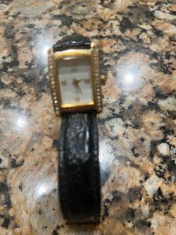 Jackie, Kennedy, antique black leather zirconia bezel women’s watch