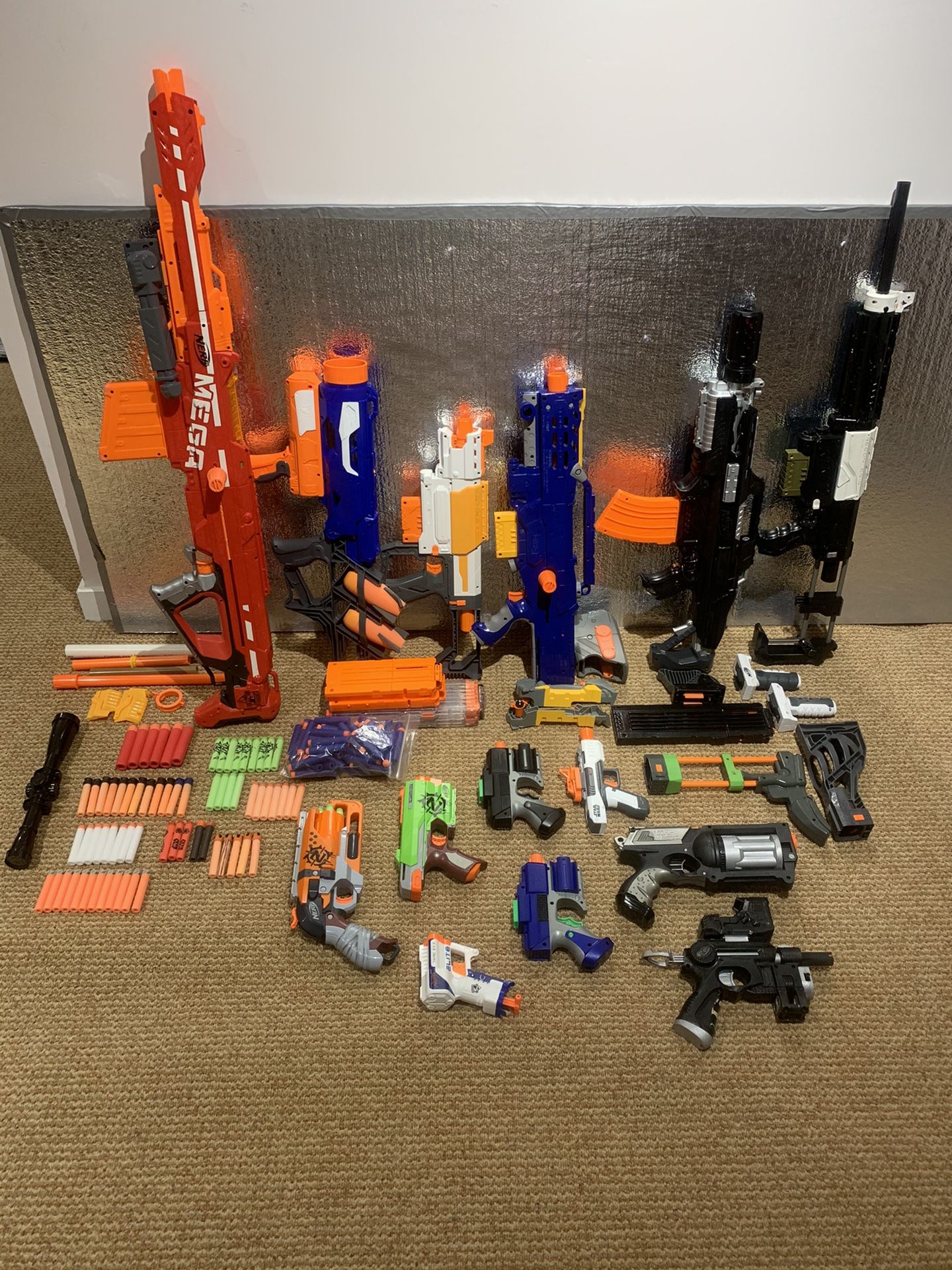Lot of nerf guns (some modded), clips, parts and ammo