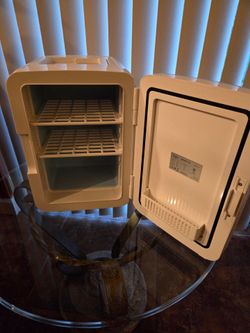 White Mini refrigerator