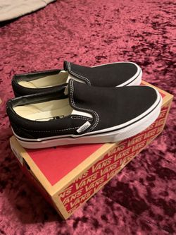 New black slip on Vans