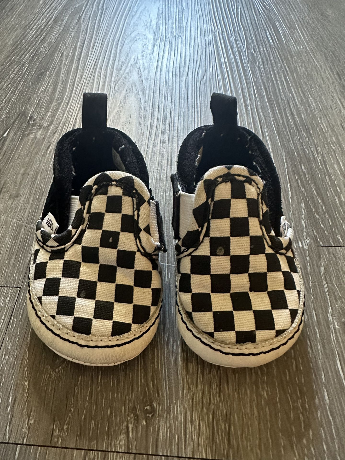 Baby Checkered Vans And black Converse 