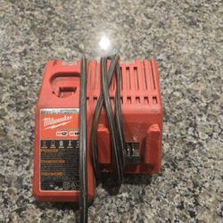 Milwaukee battery charger and hercules impact drill