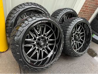 NEW 24x12 axe Offroad wheels wrapped in 285/40r24 RBP rt tires