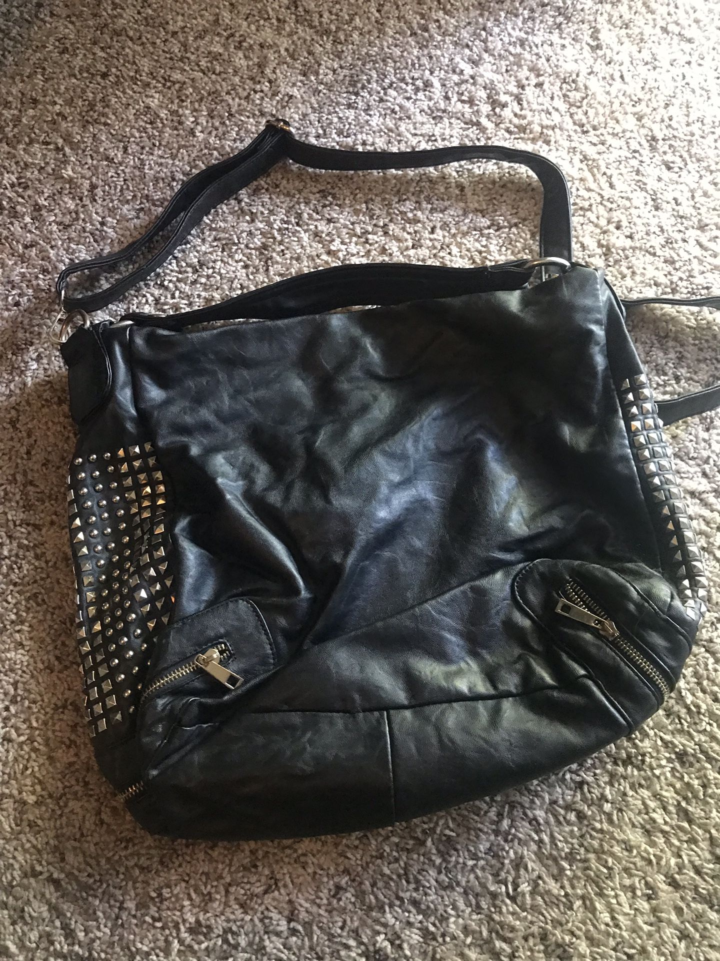 Women's studded leather handbag