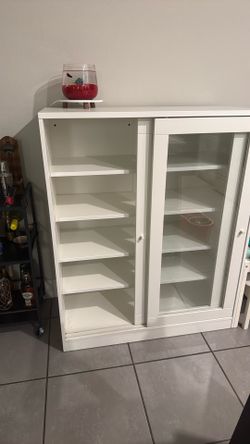 Cabinet with sliding glass doors
