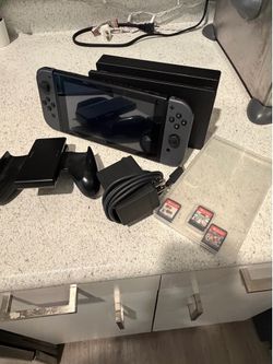 nintendo switch with 3 games