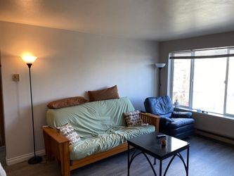 Wooden futon frame with queen mattress