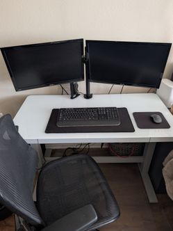 Adjustable height desk + monitors + chair +more