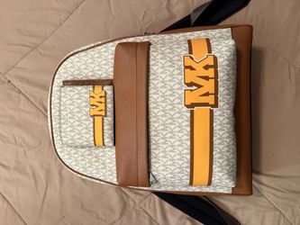 Brand new MK backpack and wallet