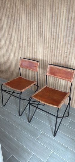 CB2 leather iron rod chairs