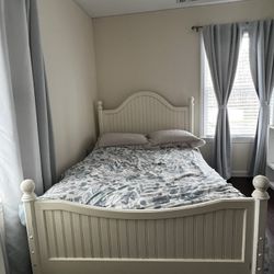 White Wooden Full sized Bed. No Mattress 