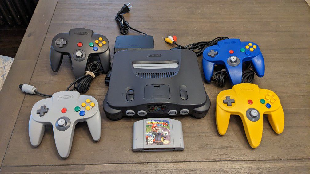 Great Condition! Nintendo N64 Party Racing Bundle, With Mario Kart 64, 4 OEM Controllers, New/Refurbished Pin Connector