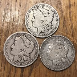 Silver Morgan Dollars.  