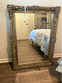 Large gold ornate mirror