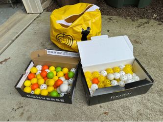 Golf practice balls and impact bag