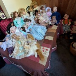 Entire lot of vintage porcelain dolls OBO