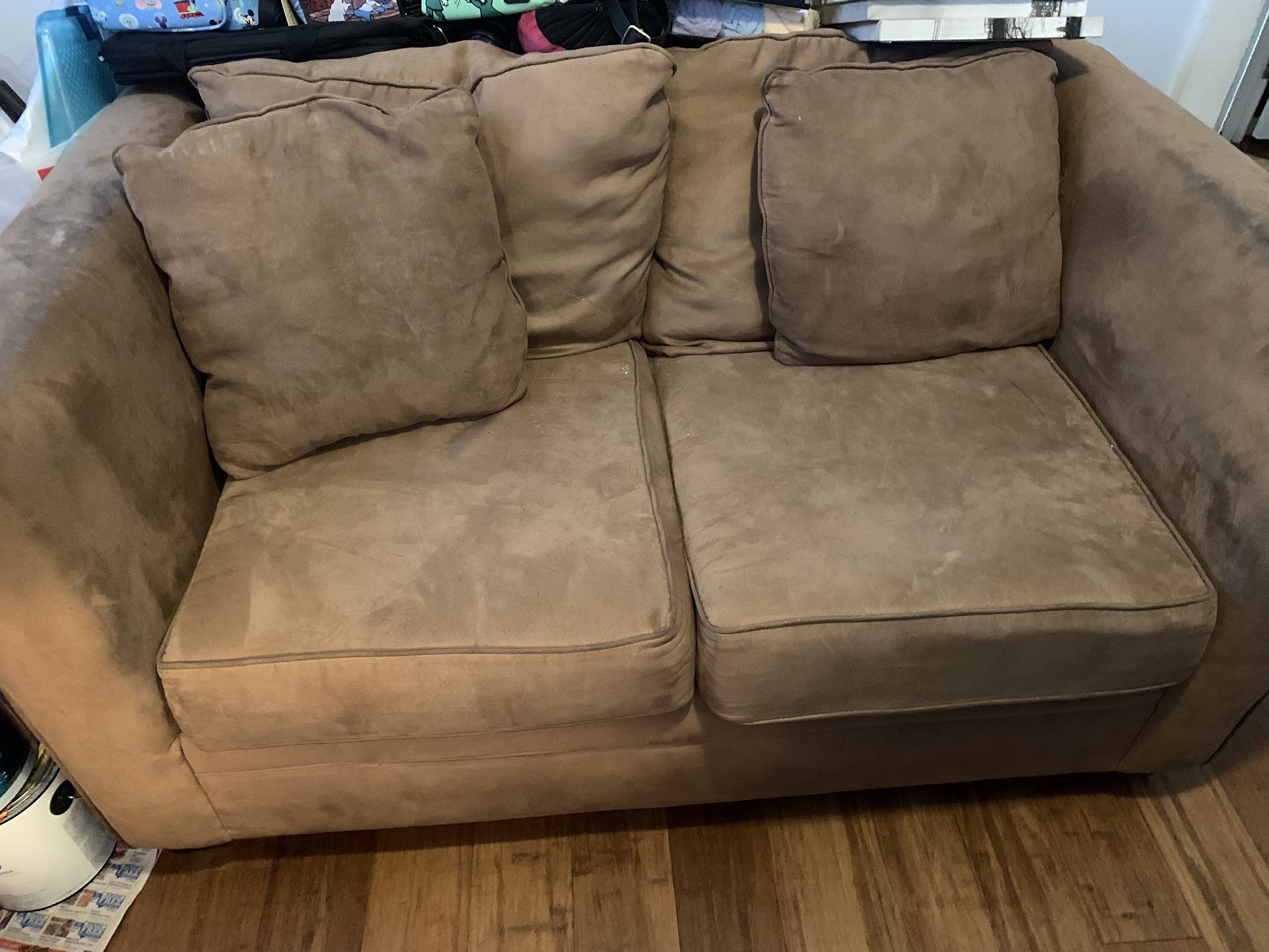 Tan Loveseat