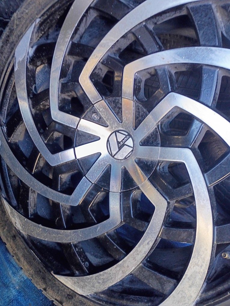 SET UNIVERSAL 22s 5 LUG $350 3 TIRES ARE IN GREAT SHAPE