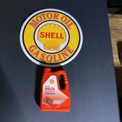 She’ll Oil Sign And A Tool Kit 