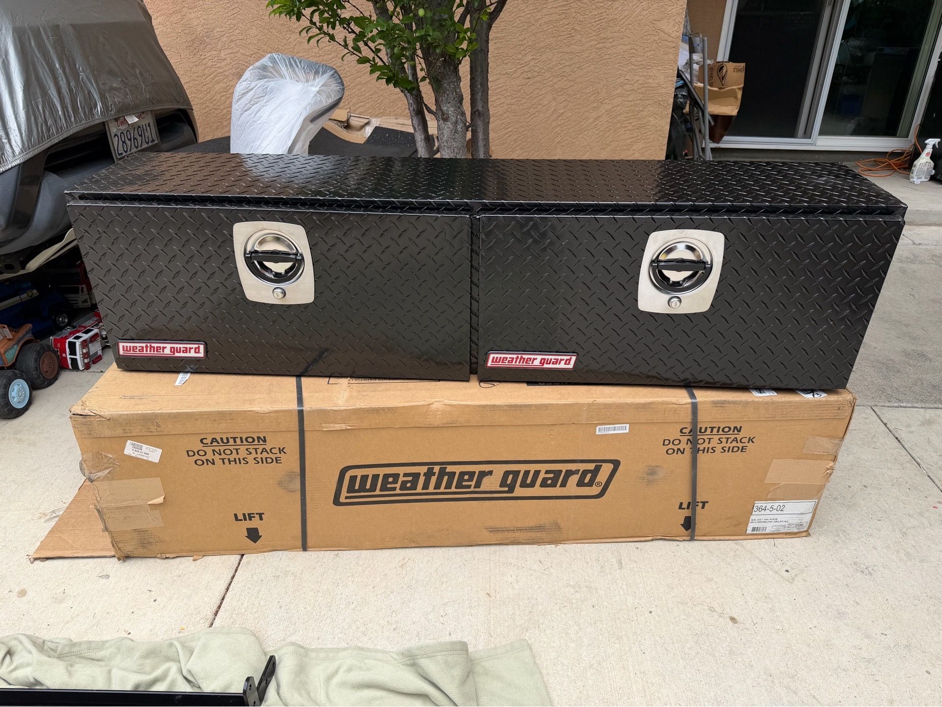 New weather guard Top Mount tool box black aluminum gloss size 64.25” long x 16” top x 13” wide asking $700