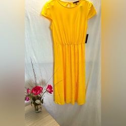 Elevate Your Style With Our Beautiful Yellow Dress Short Sleeved