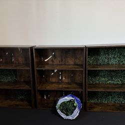 3 display shelves with fake leave background