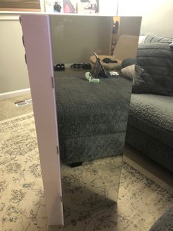 Jewelry cabinet with mirror and lights wall mounts