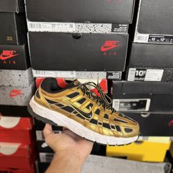 Nike P-6000 Metallic Gold Infinite Gold White Black size 10.5 USED But Clean