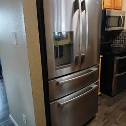 Whirlpool refrigerator And LG Stove 