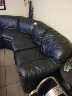 Black three sectional couch no ribs no tears