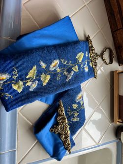 Vintage cross stitch bell pull with brass hardware