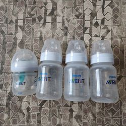 NWOB 1 125mL/4oz Bottle and 3 260mL/9oz Size 2 Anti-Colic Philips Avent Bottles