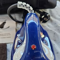 Dakine MS-256 wax iron. It's a tool designed for waxing skis and snowboards. 
Features of the Dakine MS-256 wax iron:
Adjustable Temperature Control: 