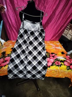 A black and a yellow planet mini dresses
