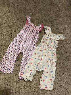 2 cute baby girl rompers! 9 months.