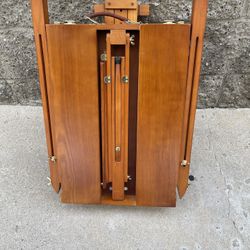 foldable French-style wooden easel. 