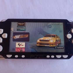 PSP WITH 5,000 GAMES 