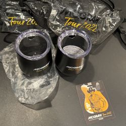 Pair of 2022 tour VIP Tim McGraw wine cup, w/ fanny packs. Wine cups unused. Includes VIP tour card