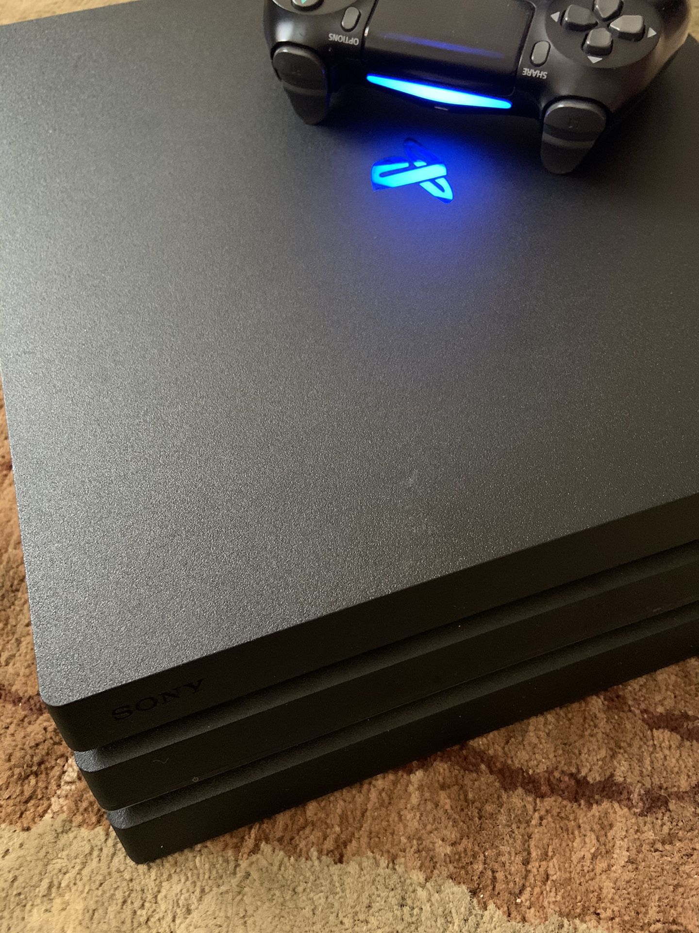 PS4 PRO 7215B (1T) WITH CONTROLLER AND 3 GAMES