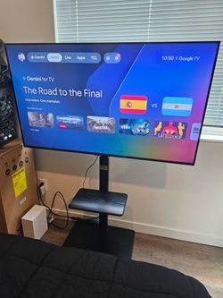 Selling 55" TV w/ stand mount
