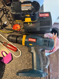 Ryobi 18v drill with battery and charger.