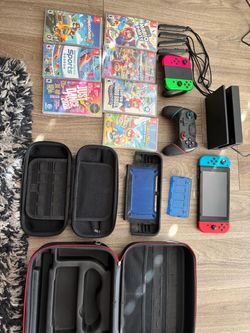 Nintendo Switch Bundle - 8 games with 5 controllers and travel cases