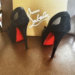 **Christian Louboutin Platform Heels