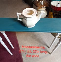 Narrow teal blue stained table