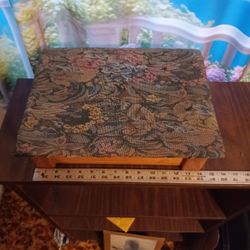 Wooden storage box with hinged lid