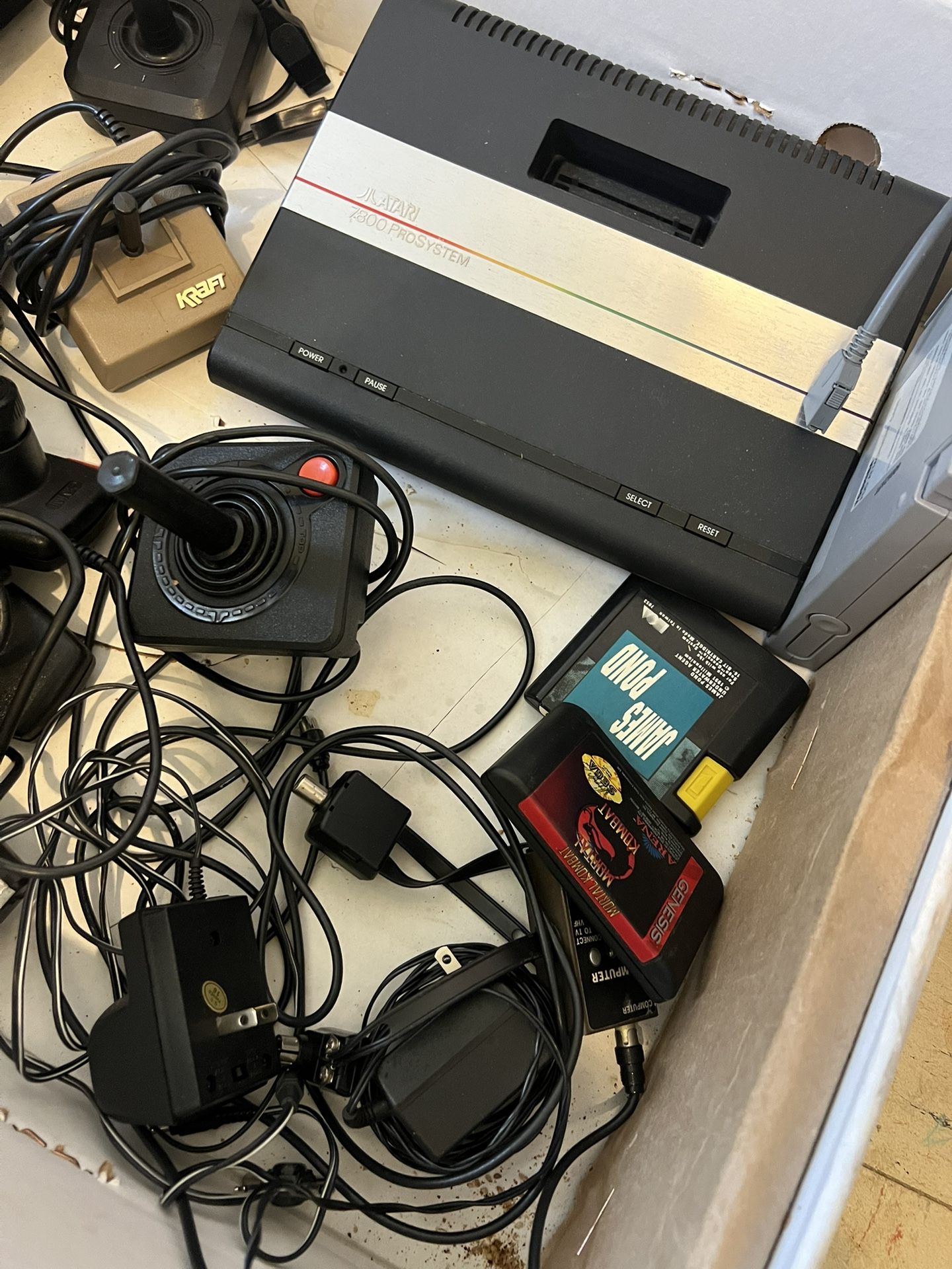 BUNDLE-2 Atari Gaming Systems Loads Of Games And Very Case Included Along With Joysticks And Remotes