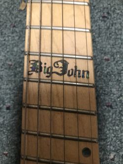 Big john headless sale guitar